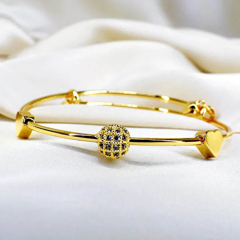 Golden Heartbeat: Stainless Steel Heart and Ball Bracelet