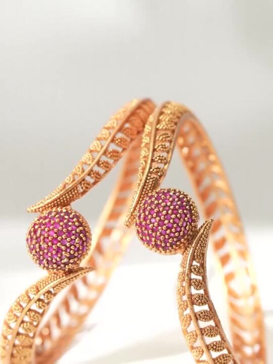 SET OF 2 GOLD-PLATED RED EMRALED STUDDED BANGELS